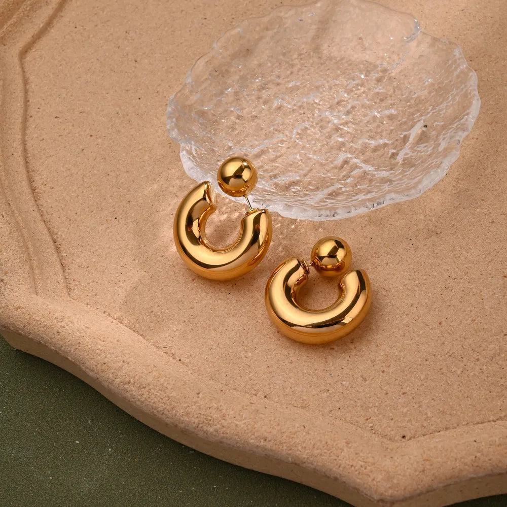 Aretes media luna